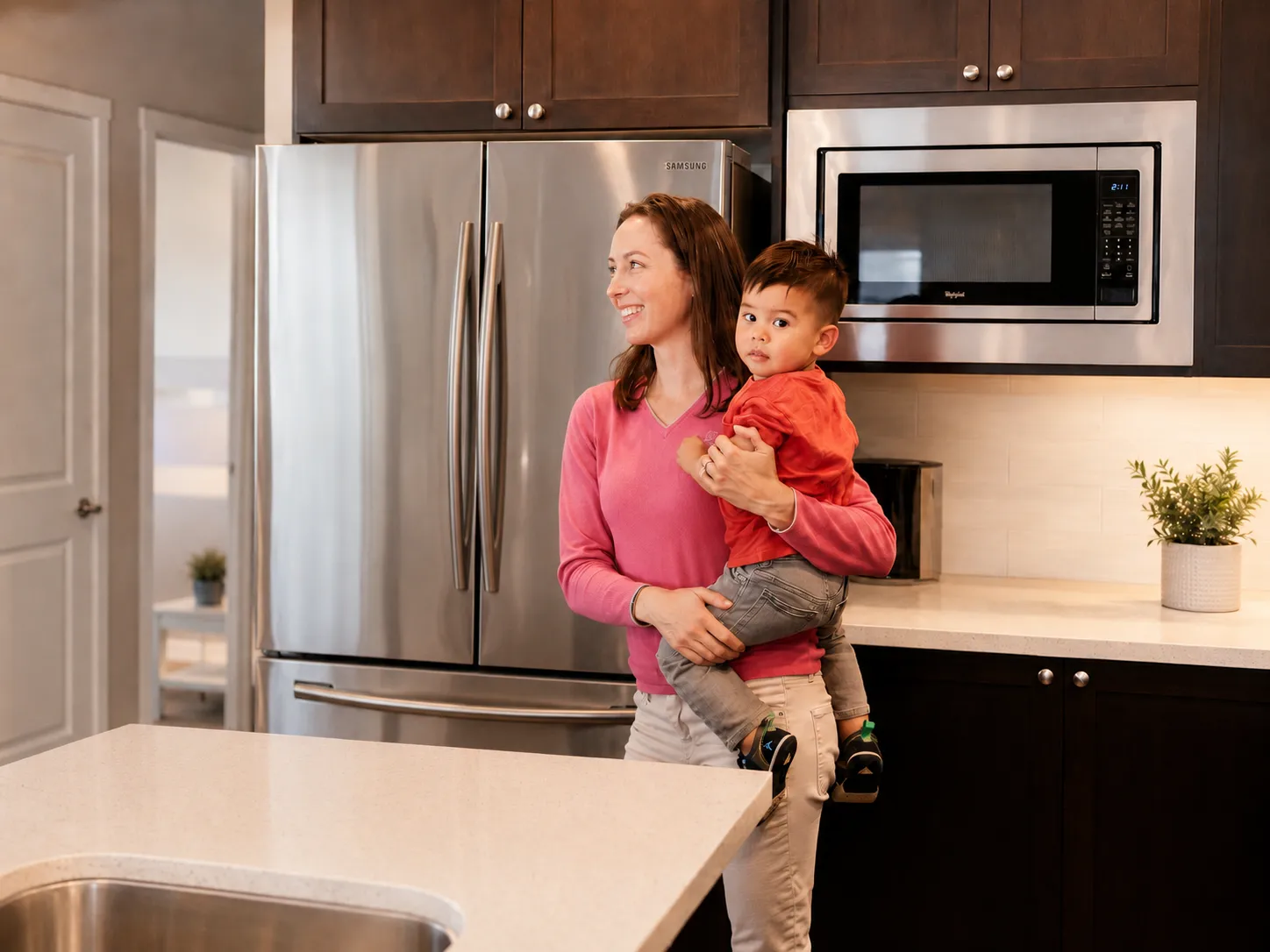 Customer happy after refrigerator repair by Elevate Repair
