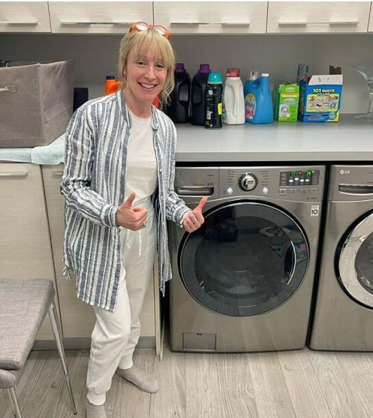 Customer happy after dryer repair by Elevate Repair