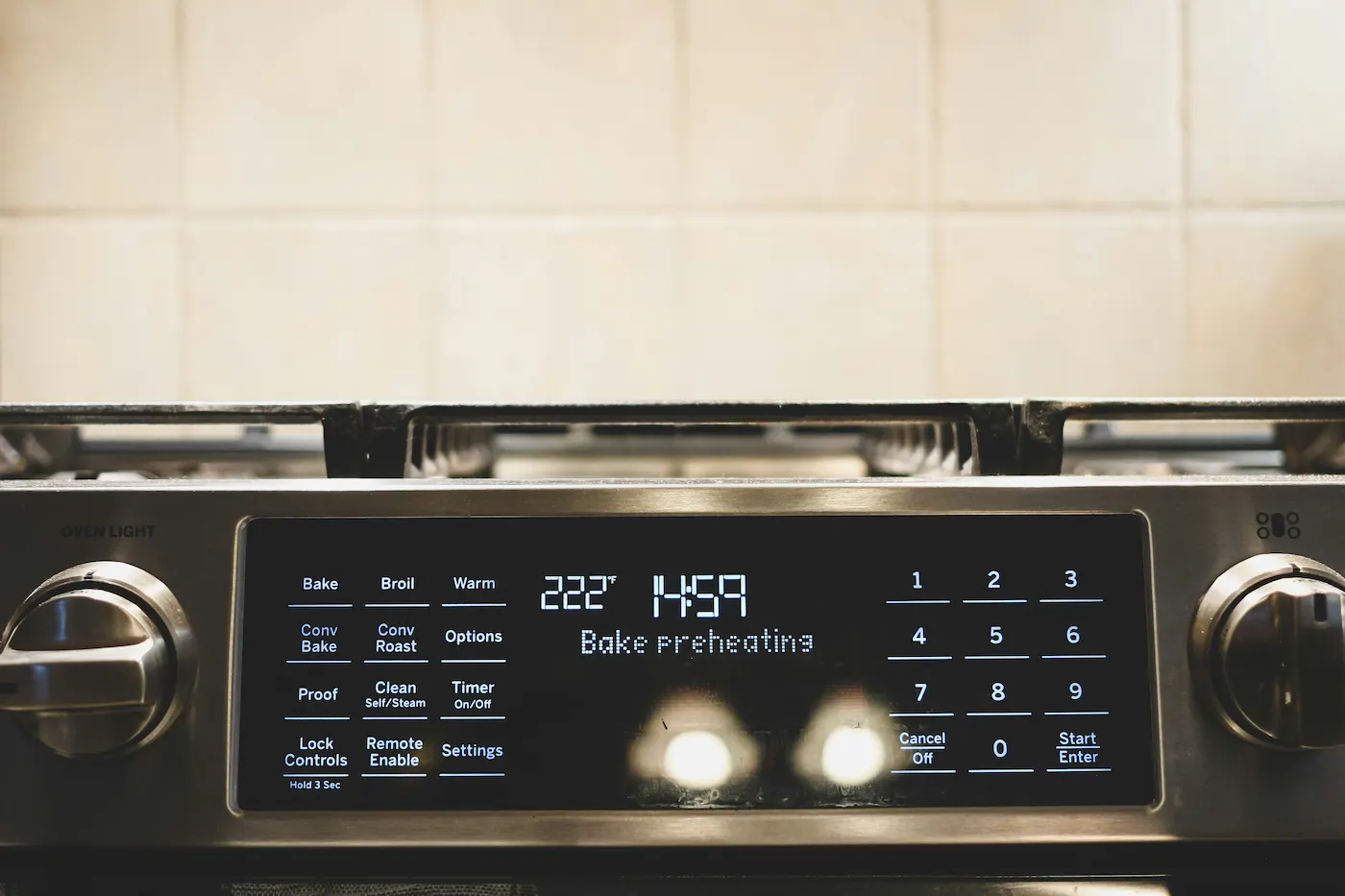 Range control panel showing the bake preheating display