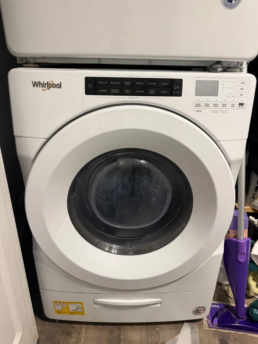 Whirlpool front-load washer under a stacked dryer